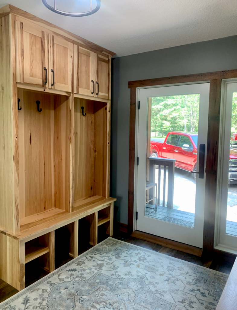 A spacious entry way with built-ins are just steps from the driveway.